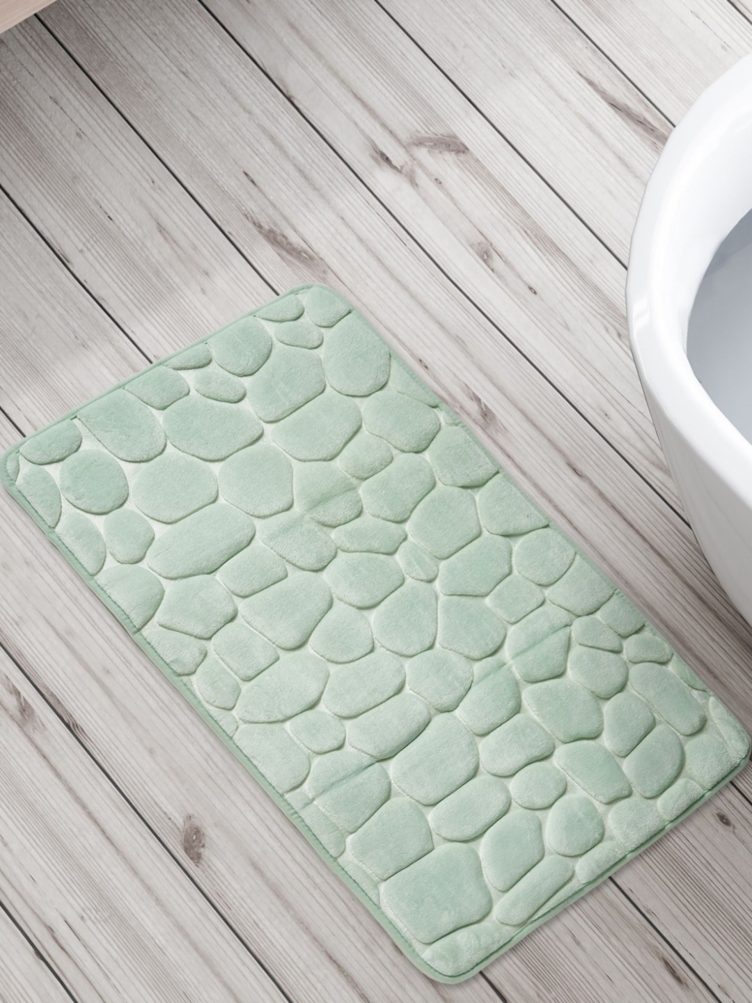 

Home Centre Buttercup Zenith Green Embossed 150 GSM Bathmat