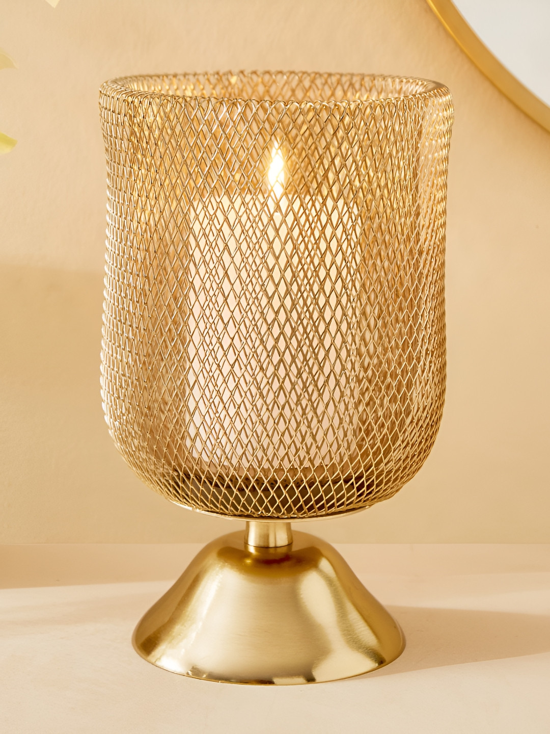 

Home Centre Gold-Toned Textured Candle Holder
