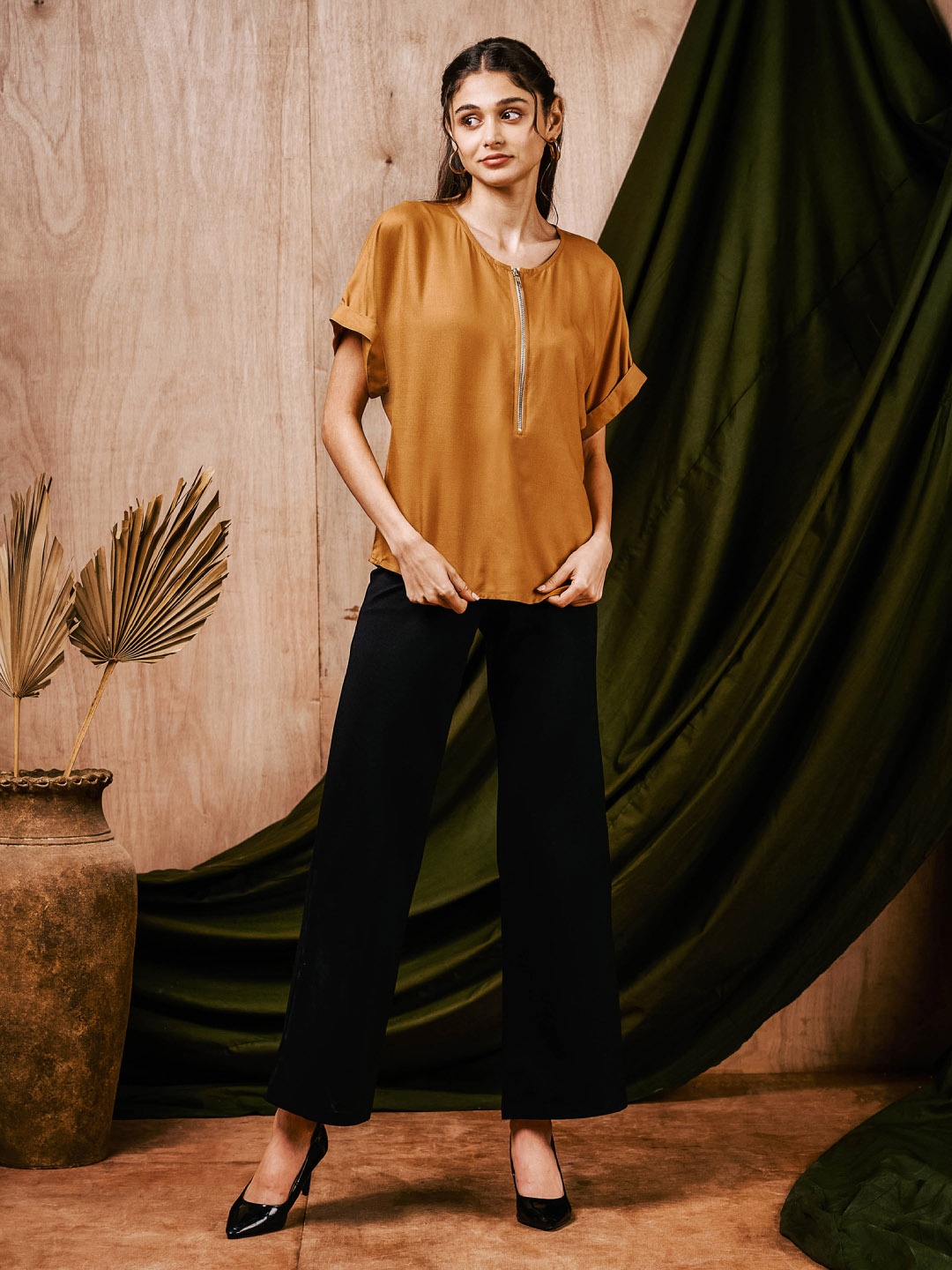 

MISH Women Solid Round Neck Top, Mustard