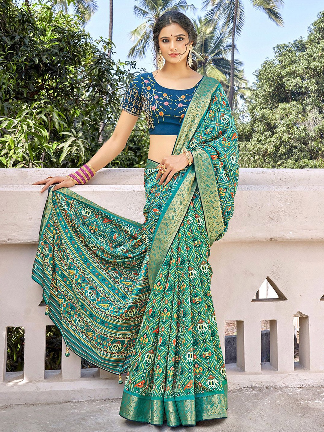 

Mitera Ethnic Motifs Woven Design Zari Patola Saree, Blue