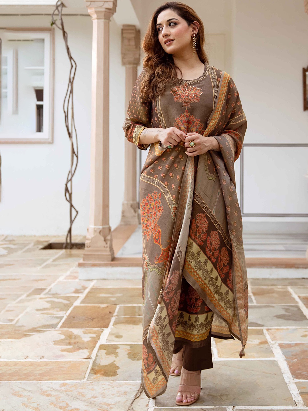 

Nehamta Women Floral Printed Regular Beads and Stones Kurta with Trousers & Dupatta, Coffee brown