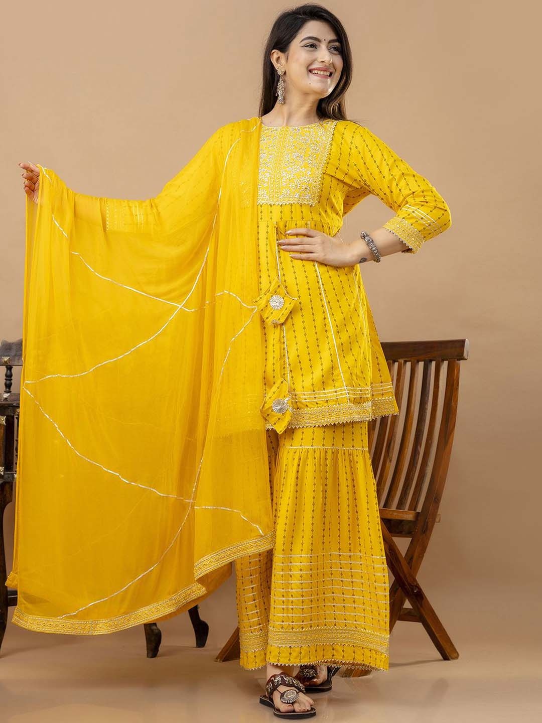 

Veshviti Women Floral Embroidered Empire Mirror Work Kurta with Sharara & With Dupatta, Yellow