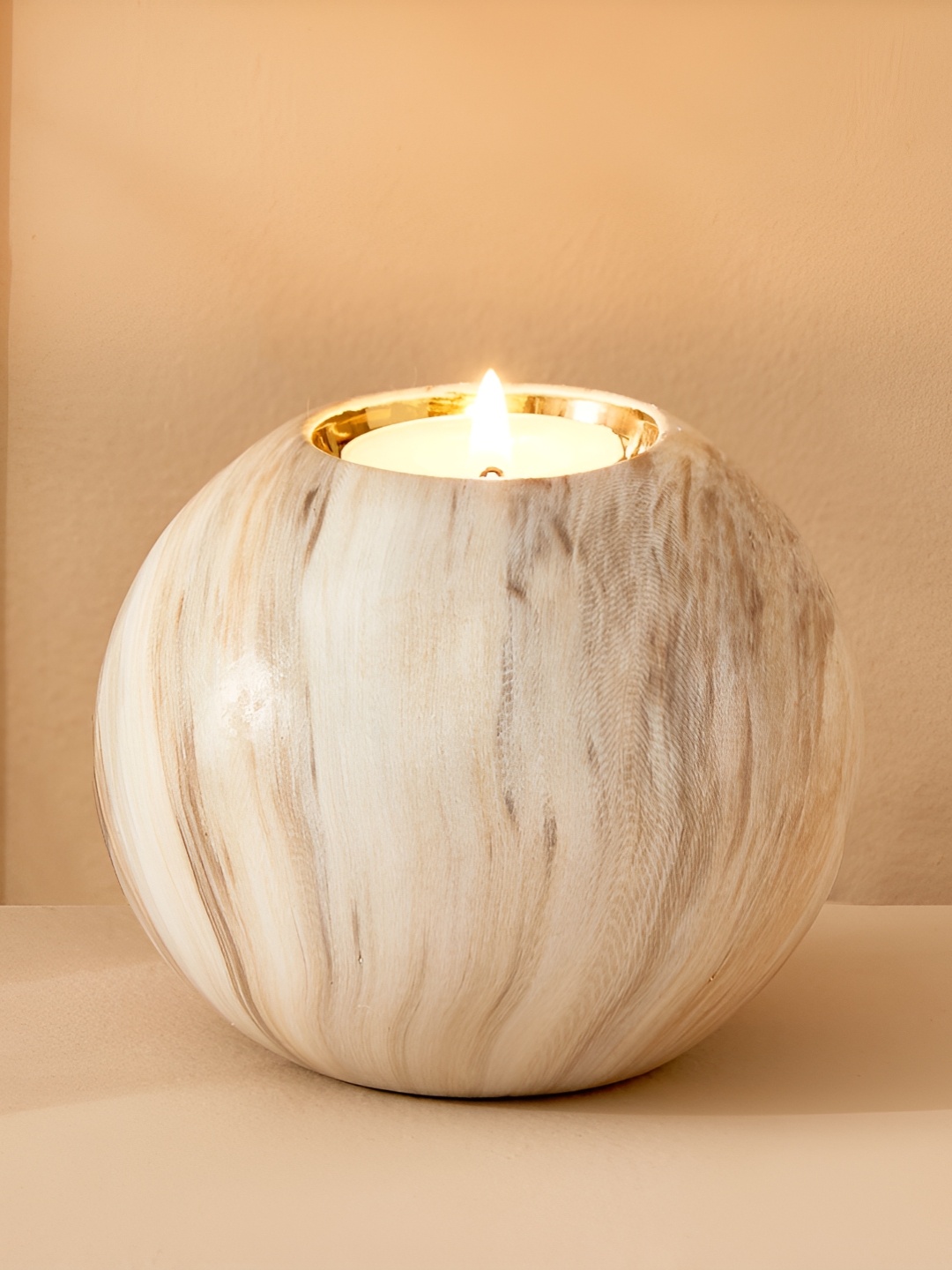 

Home Centre Gold-Toned & Off White Textured Ceramic Candle Holder