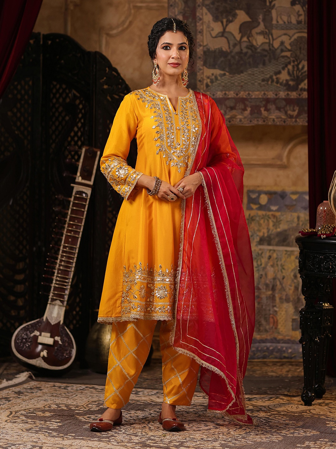 

SCAKHI Ethnic Motifs Embroidered Gotta Patti Anarkali Kurta with Salwar & Dupatta, Mustard