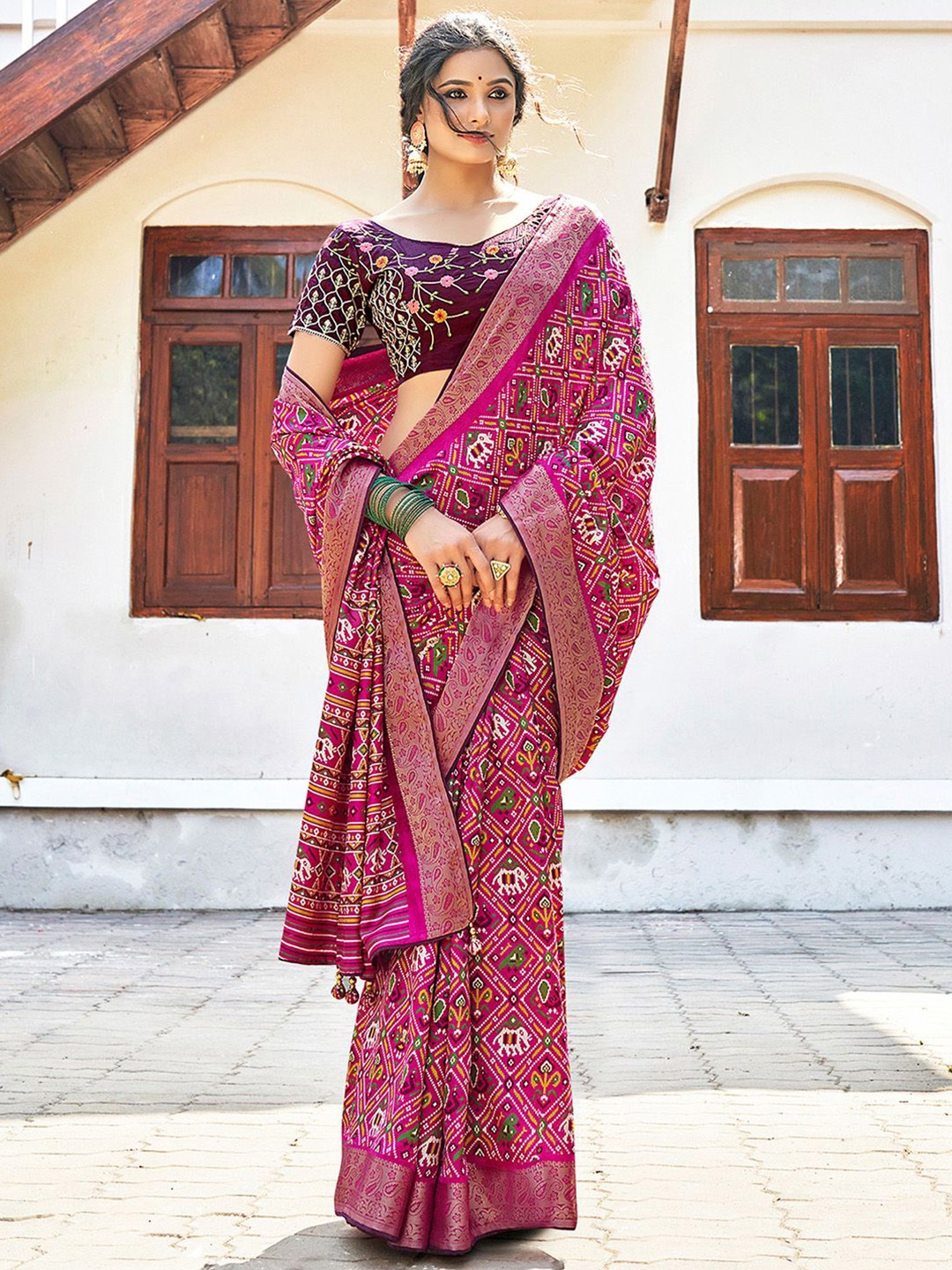 

Mitera Ethnic Motifs Printed Zari Patola Celebrity Saree, Pink