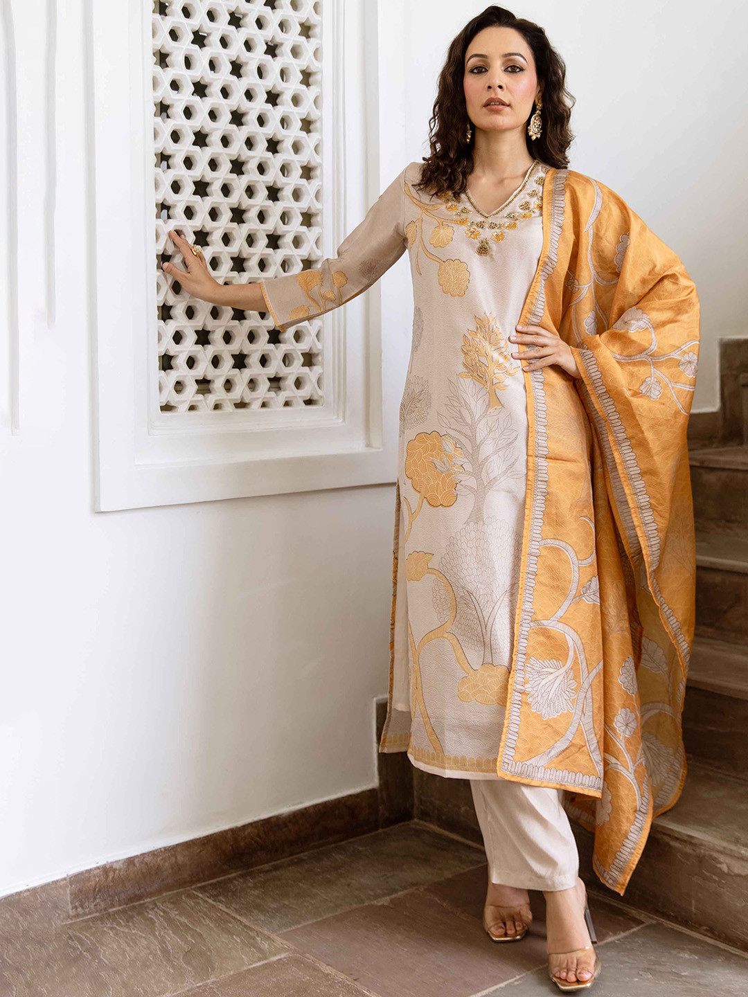 

KALINI Women Floral Printed Regular Beads and Stones Kurta with Trousers & Dupatta, Cream