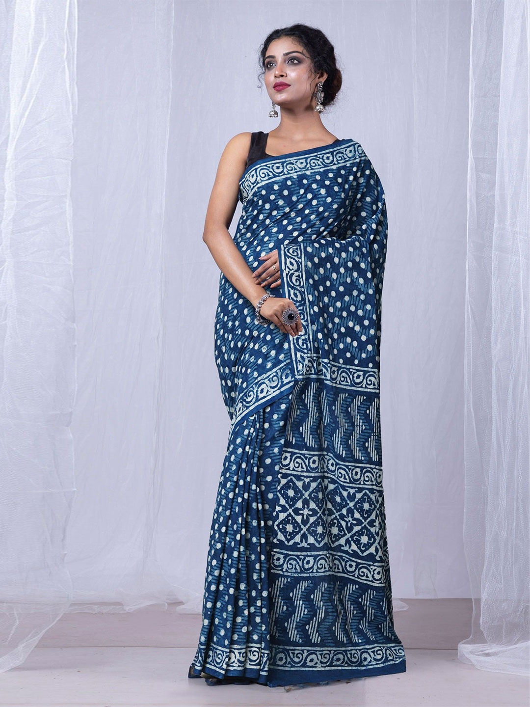 

Unnati Silks Floral Pure Cotton Handloom Dabu Saree, Blue