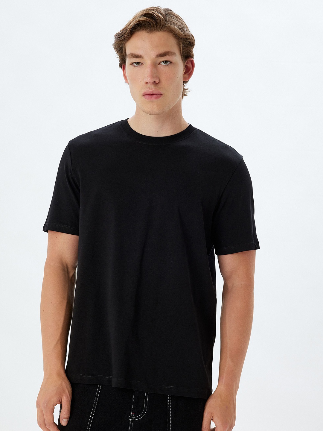 

Koton Men Solid Round Neck Cotton T-shirt, Black