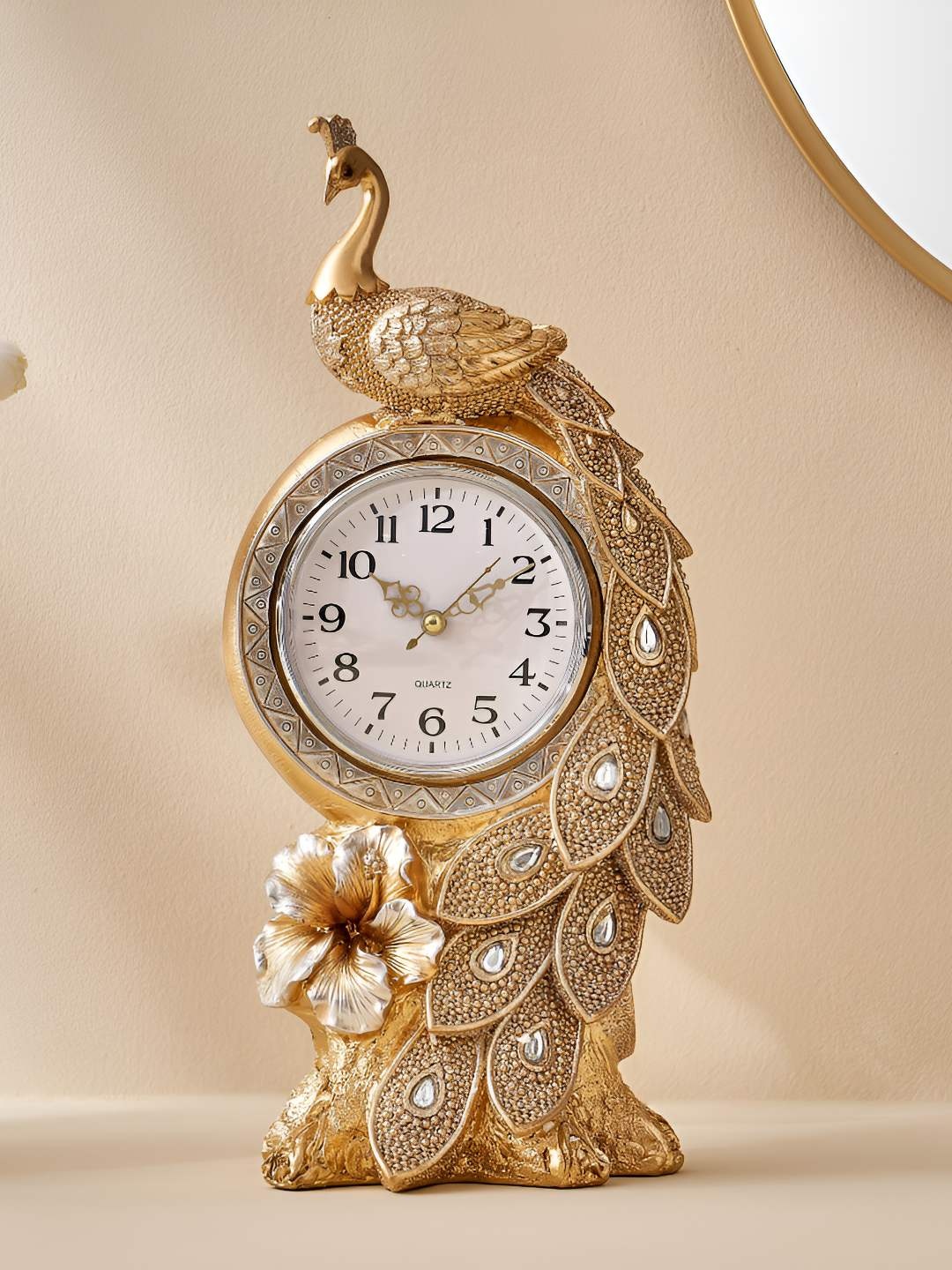 

Home Centre Corsica Mayur Gold-Toned Embellished Animal Shaped Traditional Table Clock