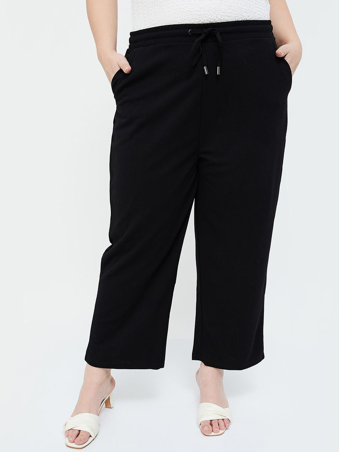 

Nexus by Lifestyle Women Solid Regular Trousers, Black