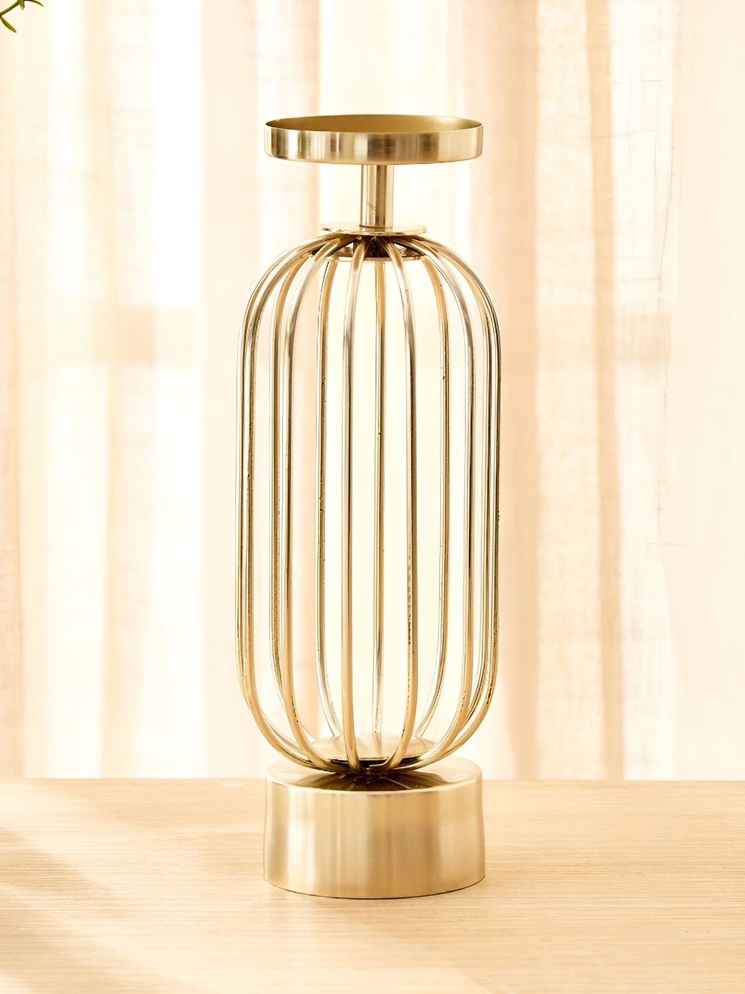 

Home Centre Gold-Toned Textured Candle Holder