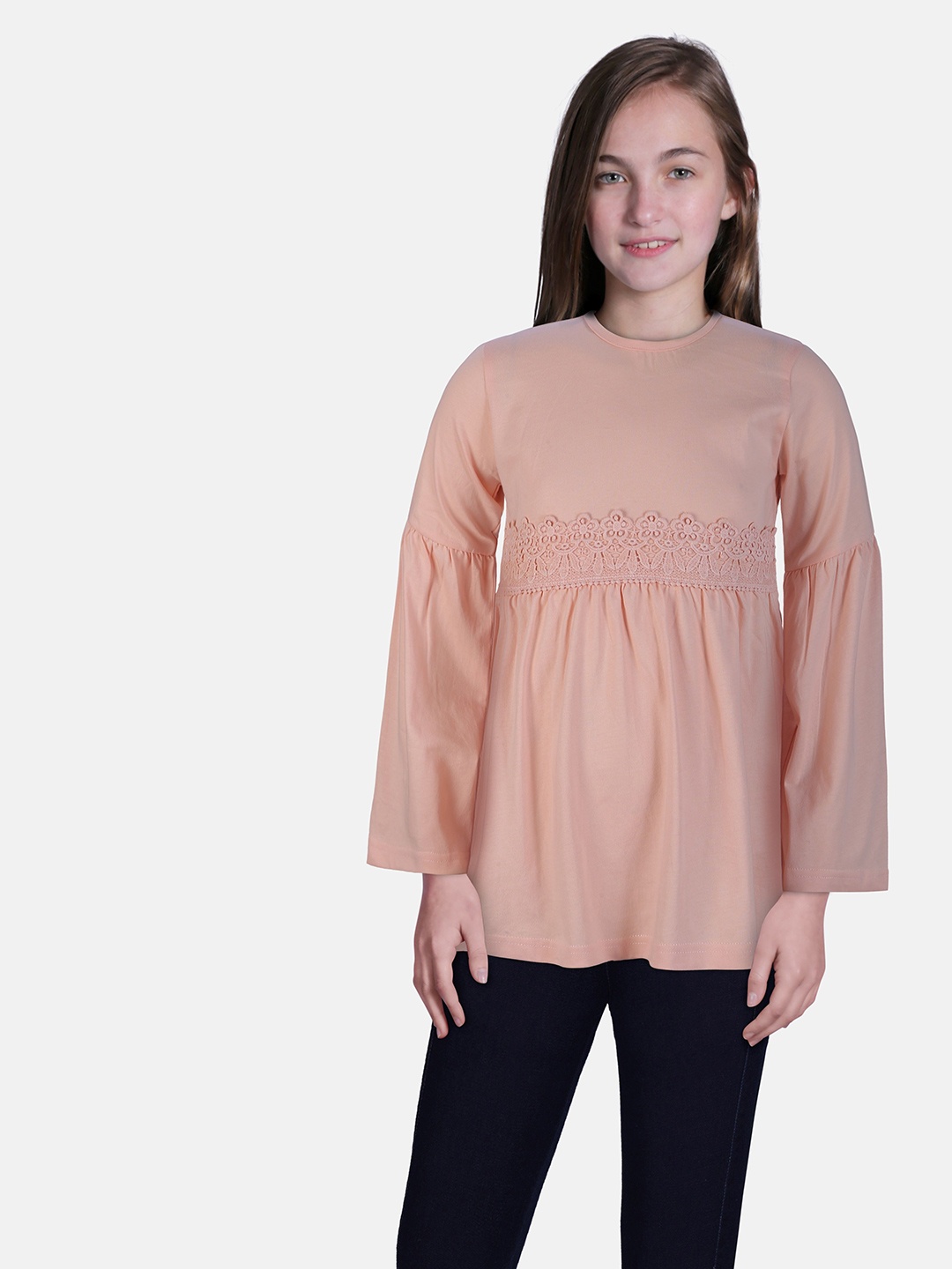

Gini and Jony Girls Solid Round Neck Cotton Top, Peach