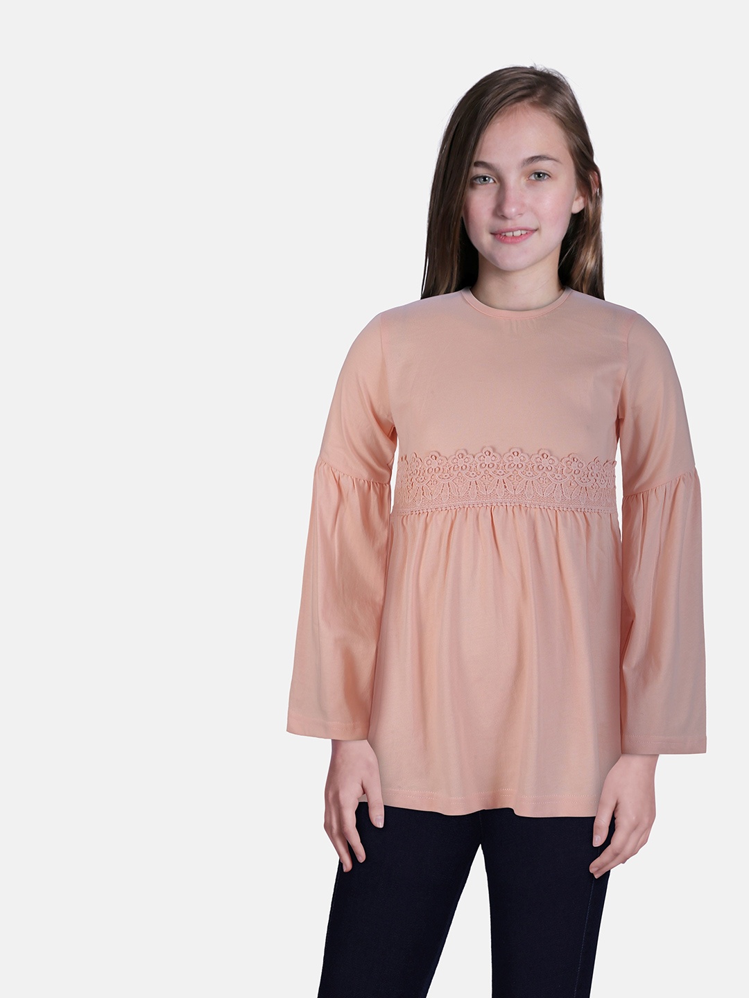 

Gini and Jony Girls Solid Round Neck Cotton Top, Peach