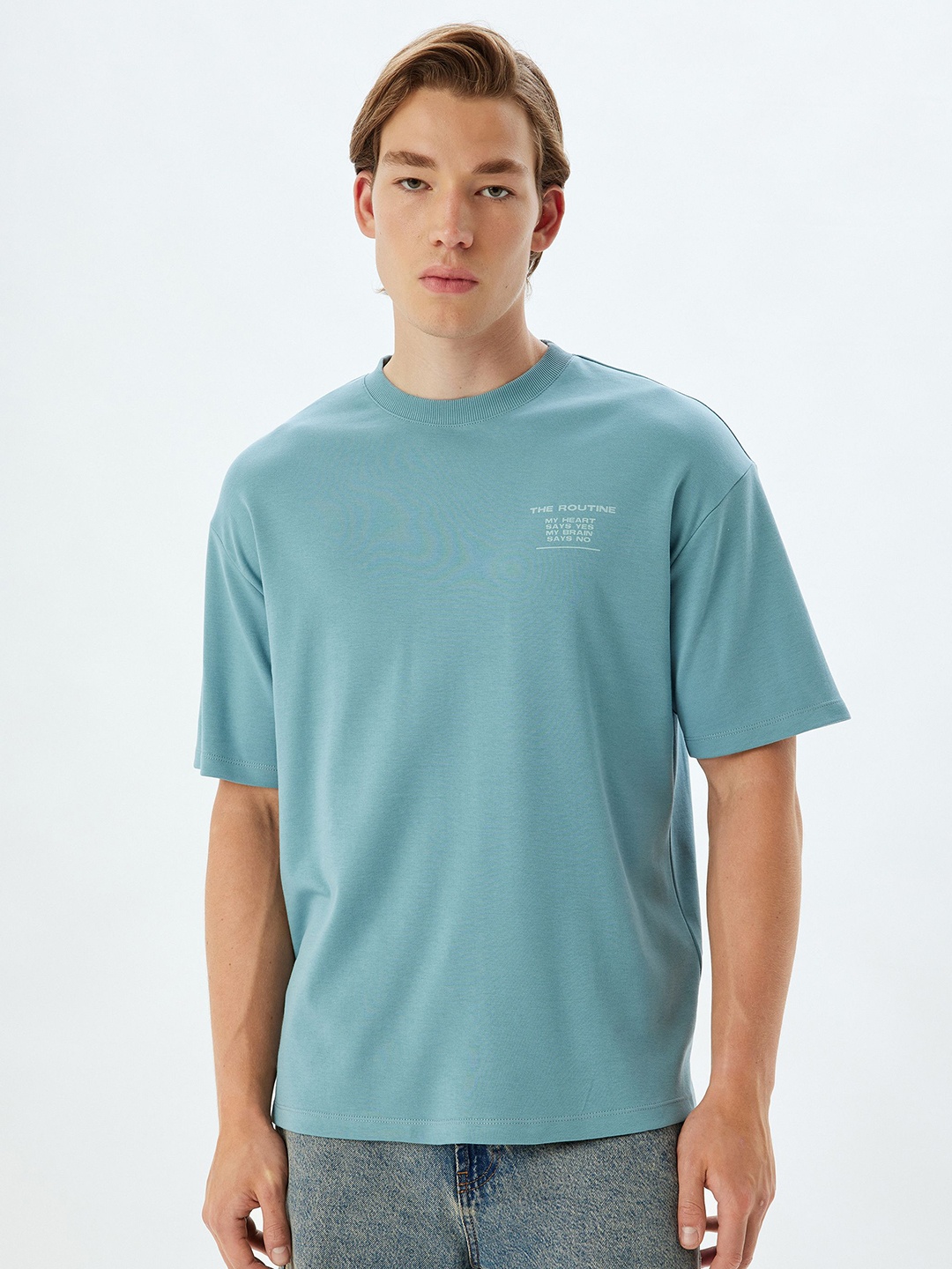 

Koton Men Solid Round Neck Cotton Oversized T-shirt, Green