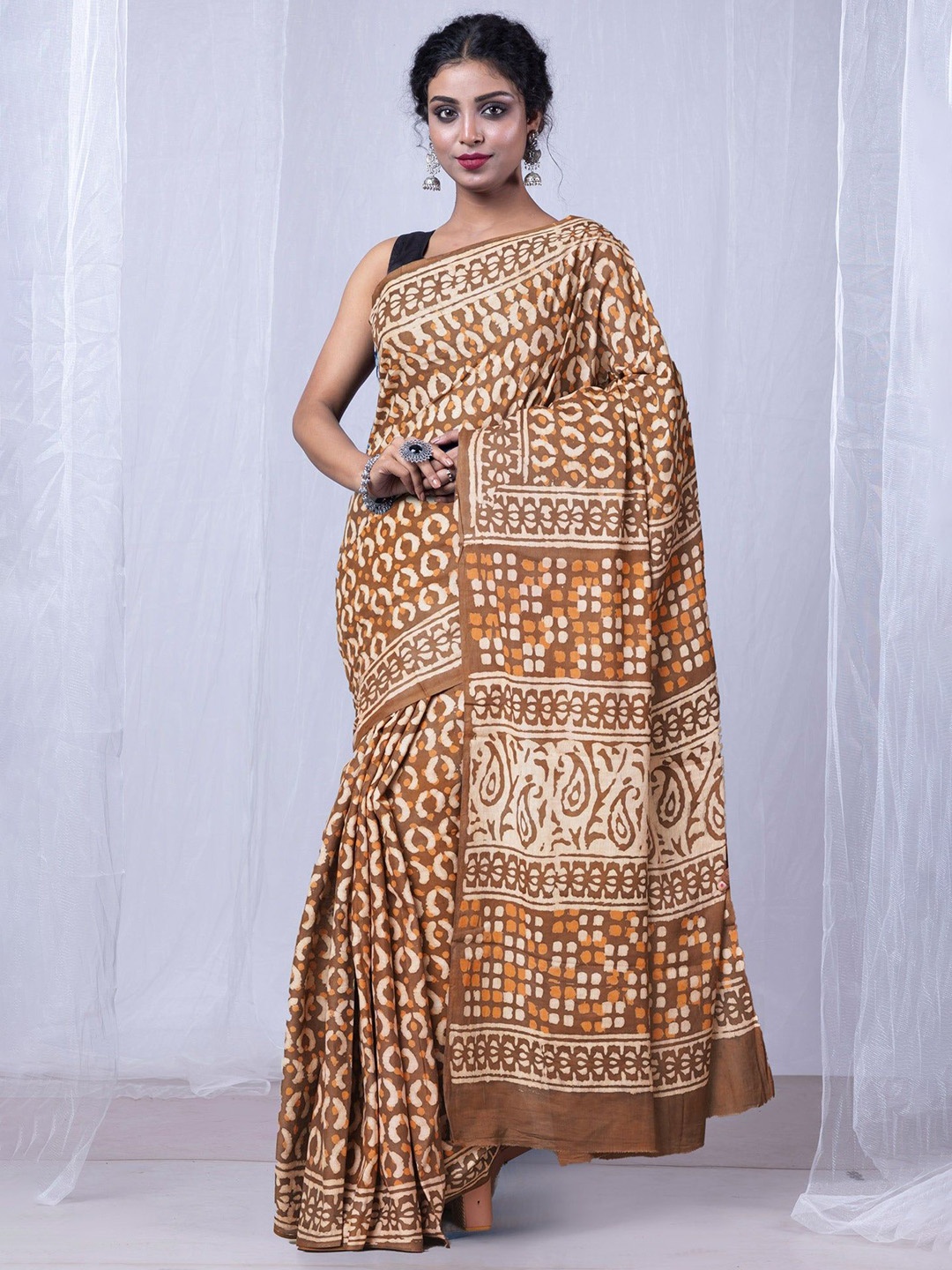 

Unnati Silks Pure Cotton Handloom Dabu Saree, Brown