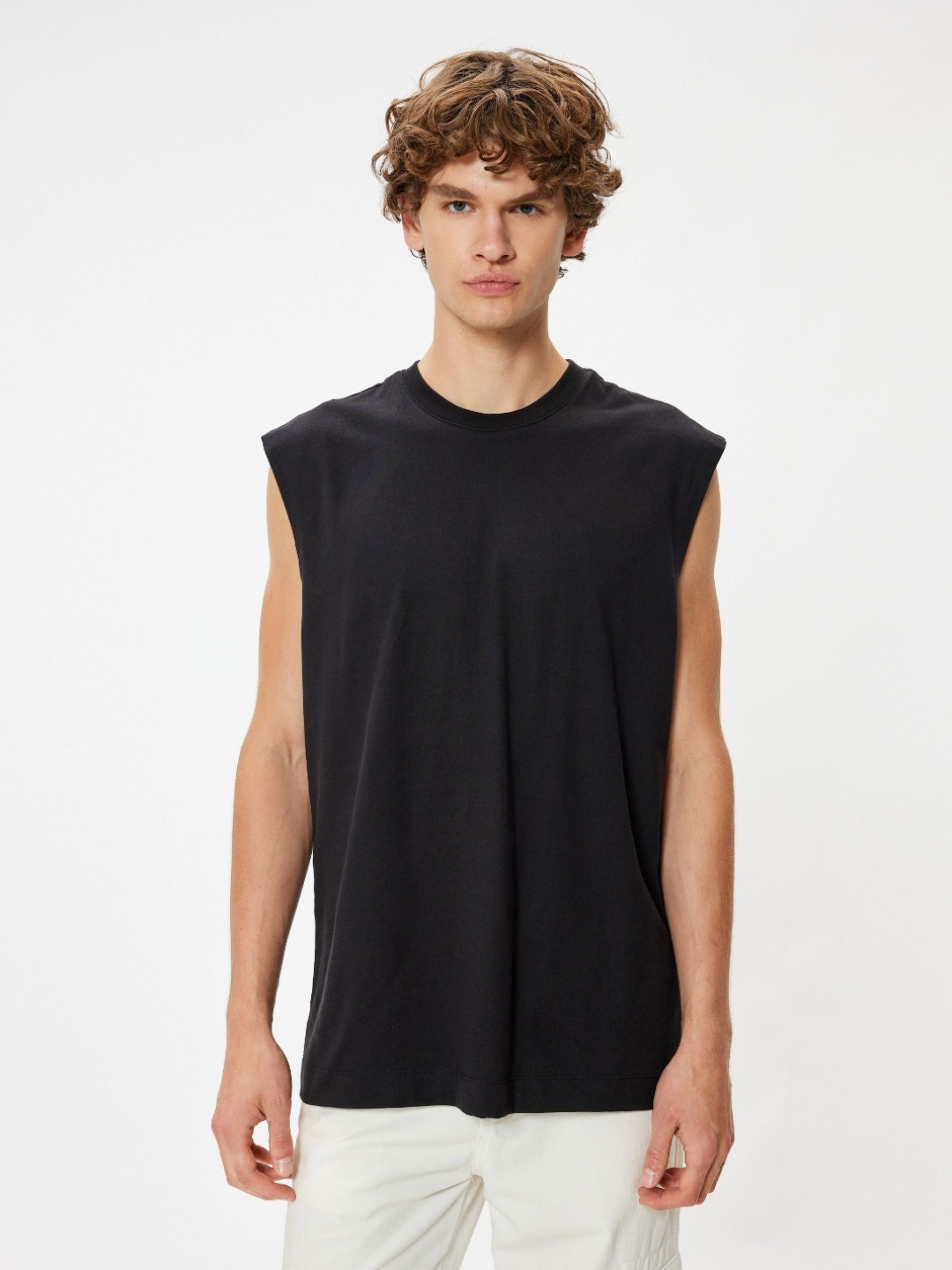 

Koton Men Solid Round Neck Cotton T-shirt, Black