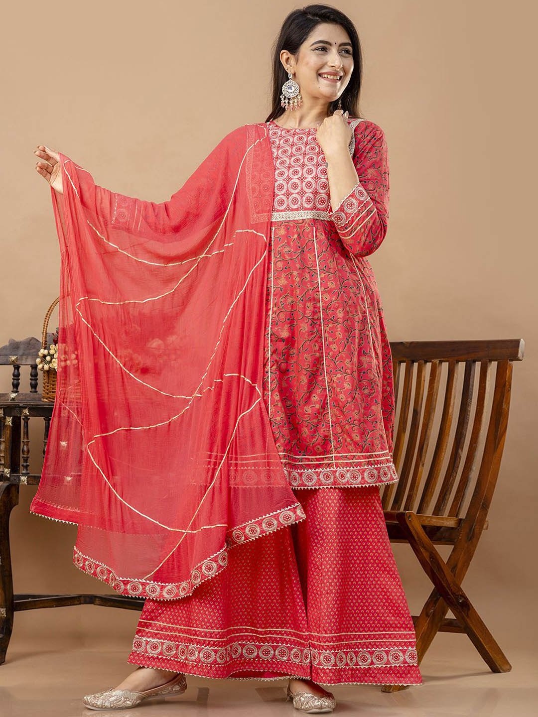 

Veshviti Women Floral Embroidered Empire Mirror Work Kurta with Sharara & With Dupatta, Peach