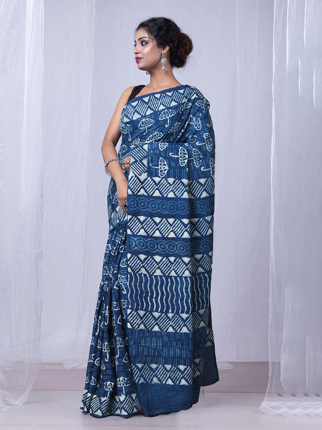 

Unnati Silks Ethnic Motifs Pure Cotton Handloom Dabu Saree, Blue
