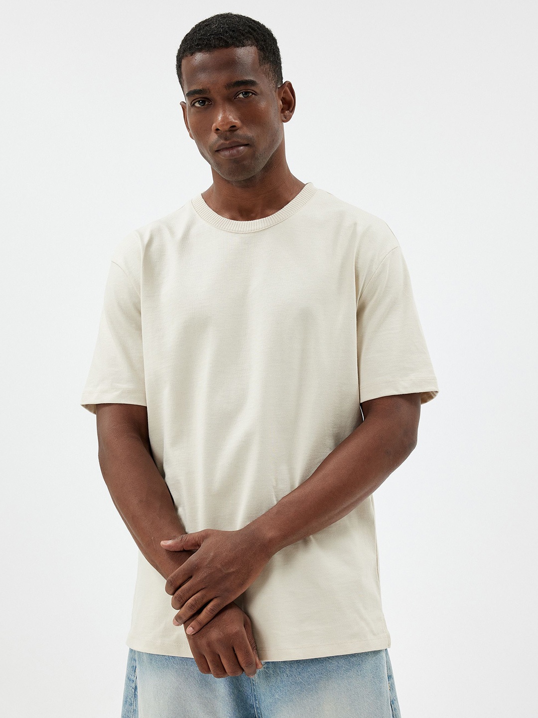 

Koton Men Solid Round Neck Cotton T-shirt, Beige