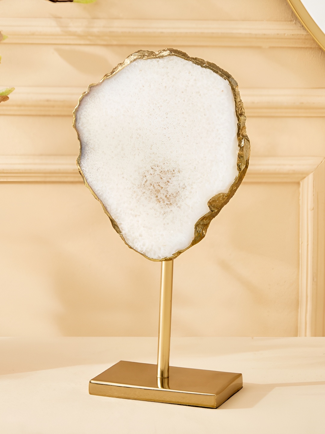 

Home Centre Eternity vogue White Metal Curio Showpiece