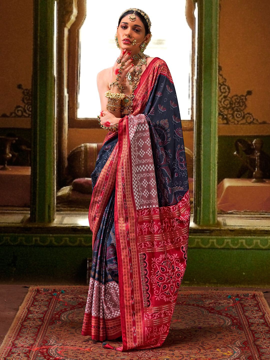 

Panzora Women Floral Zari Patola Saree, Blue