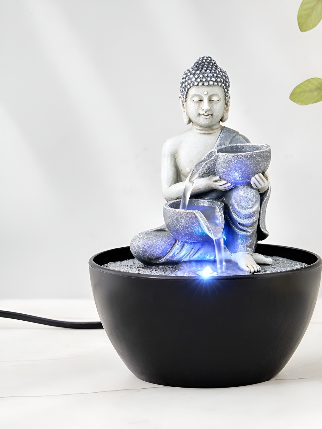 

Home Centre Silver-Toned & Blue Buddha Fountains