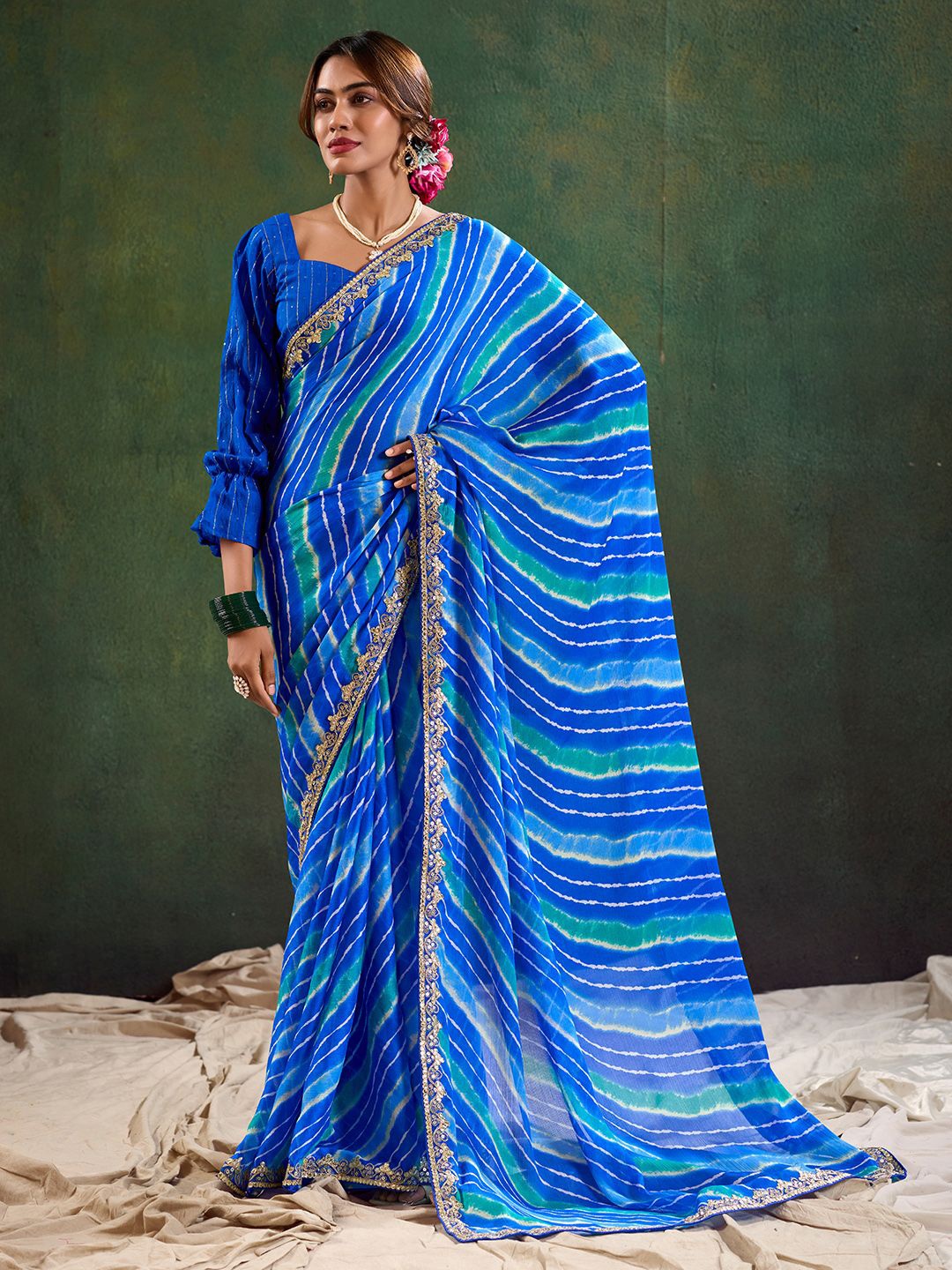 

Mitera Leheriya Sequinned Poly Chiffon Saree With Unstitched Blouse Piece, Blue
