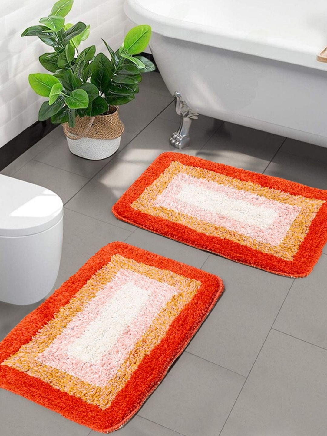 

Saral Home Orange 2 Pieces Microfibre Anti Skid Bath Mats