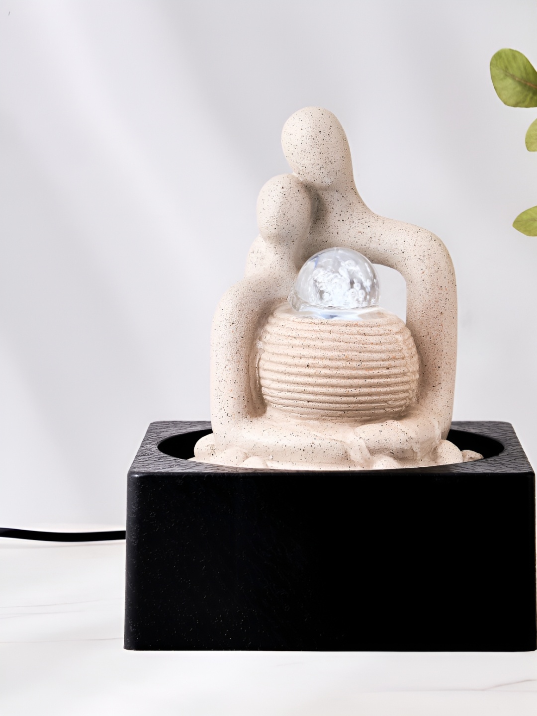 

Home Centre Corsia Alpine Beige & Black Textured Couple Fountains