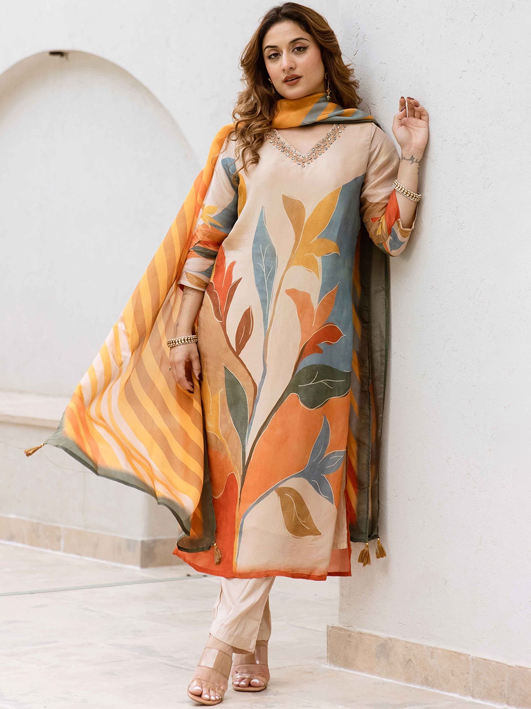 

KALINI Women Floral Printed Regular Beads and Stones Kurta with Trousers & Dupatta, Peach