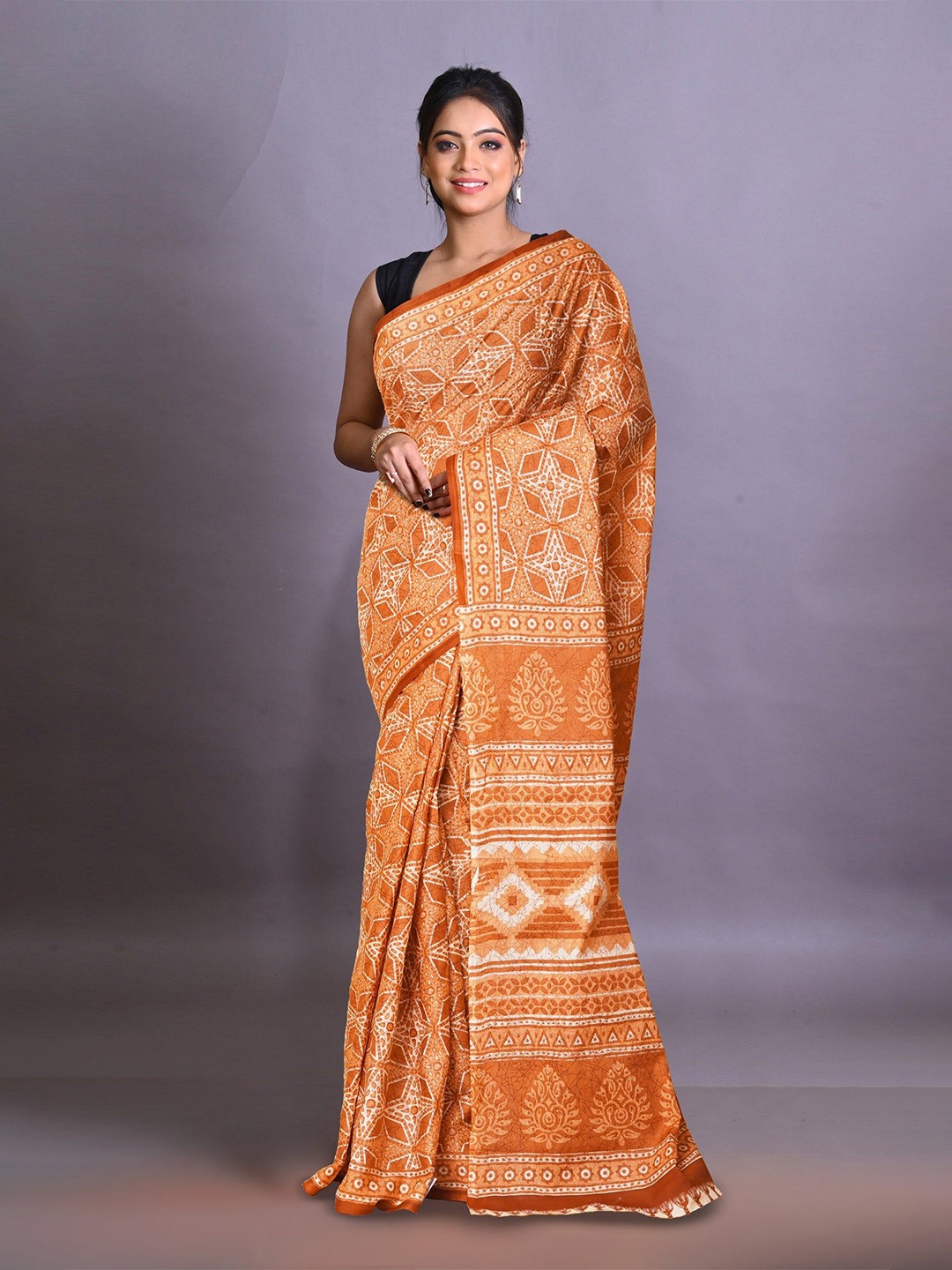 

Unnati Silks Floral Pure Cotton Handloom Block Print Saree, Orange