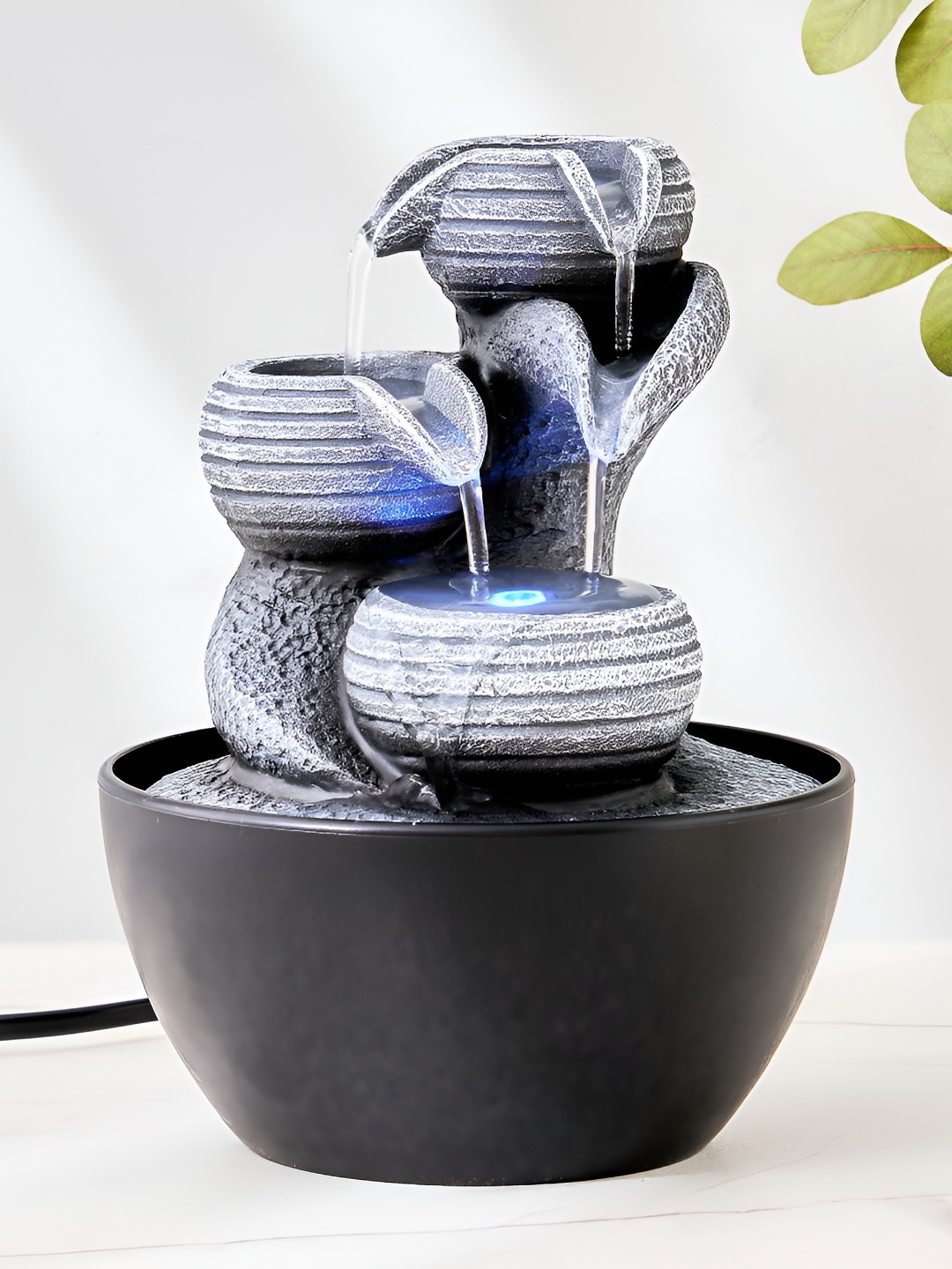 

Home Centre Corsica Alpine Black & Grey Diya Flow Water Fountain