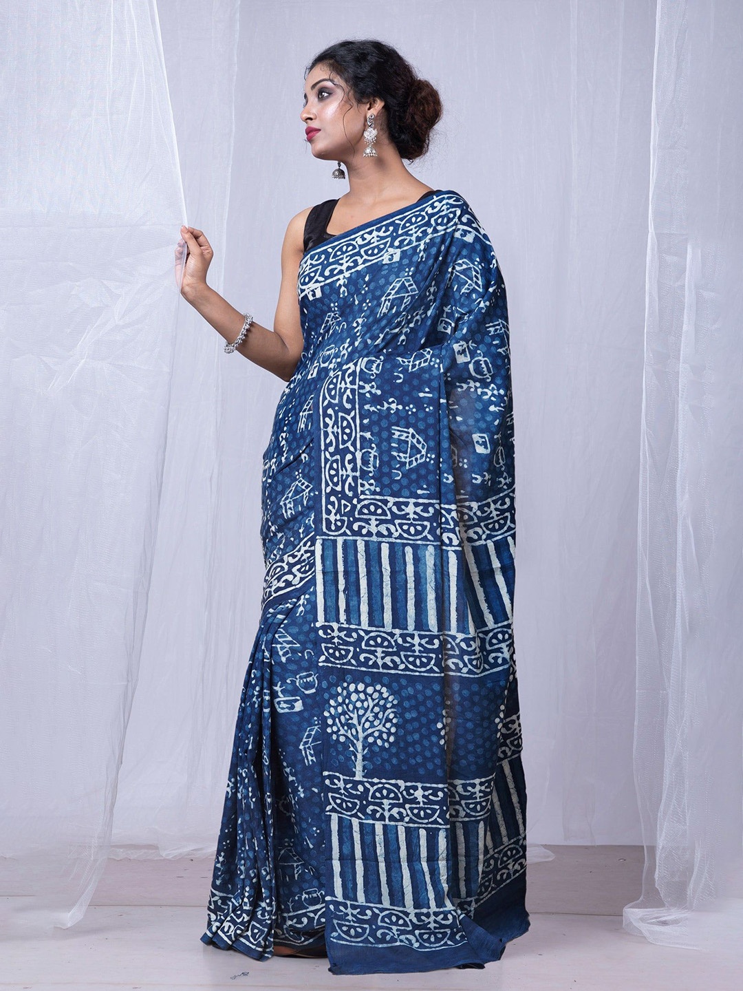 

Unnati Silks Warli Printed Pure Cotton Handloom Dabu Saree, Blue