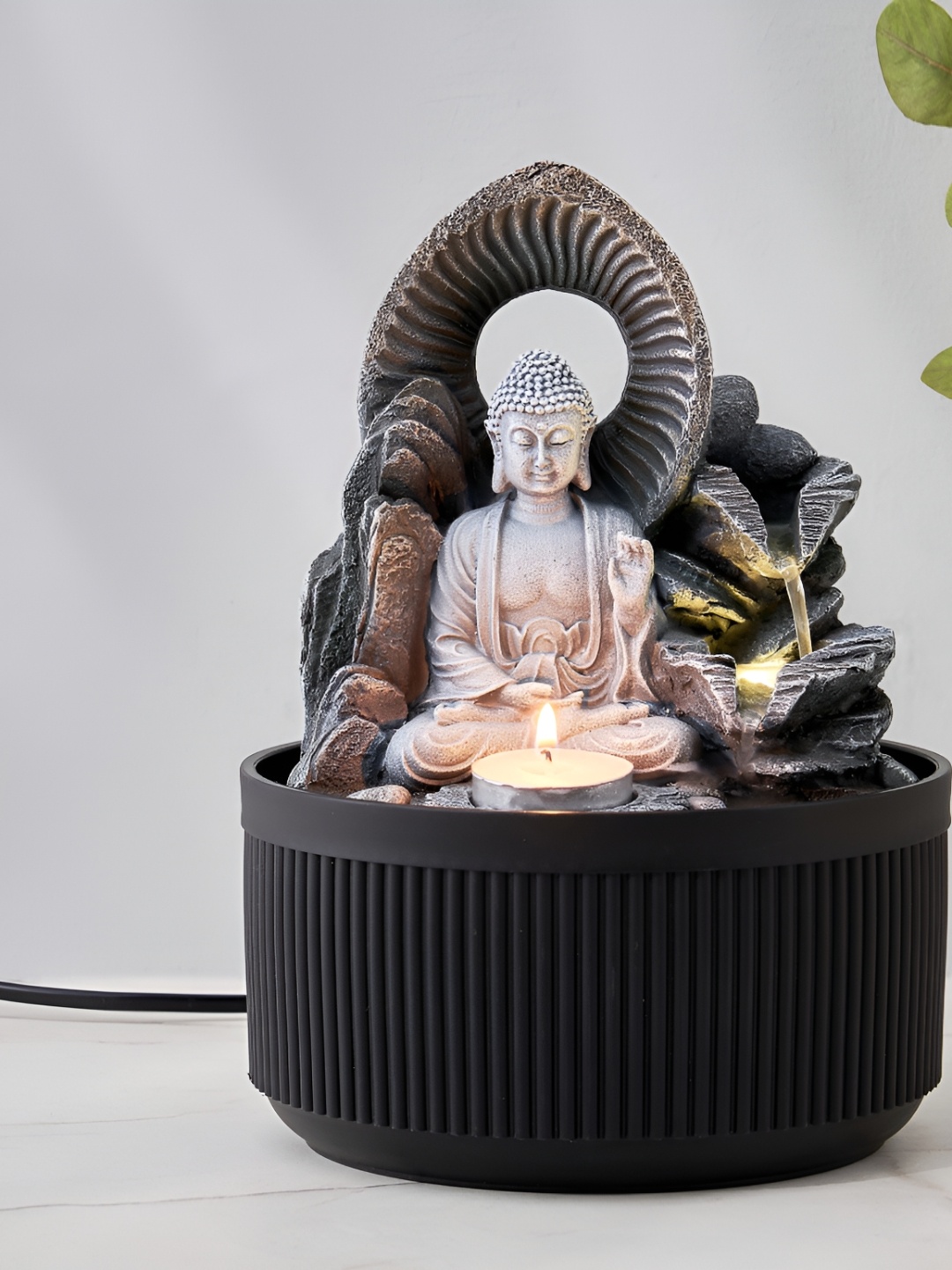 

Home Centre Corsica Alpine Brown Buddha Fountain With T-Light Holder, Silver