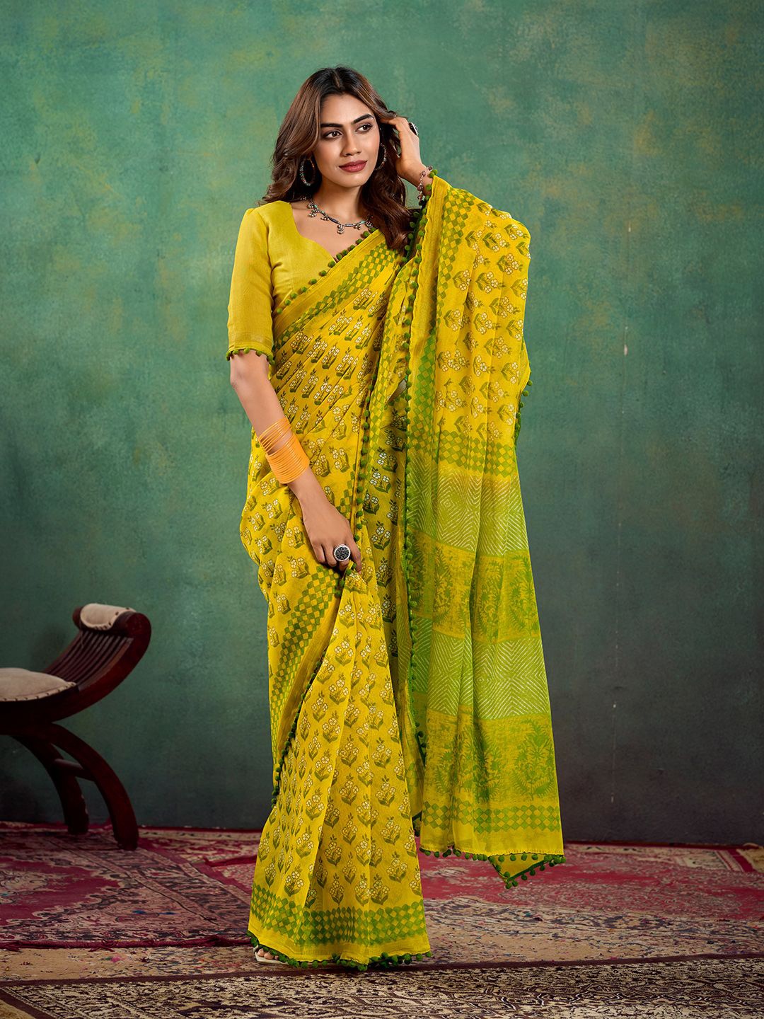 

Mitera Ethnic Motifs Printed Saree, Yellow