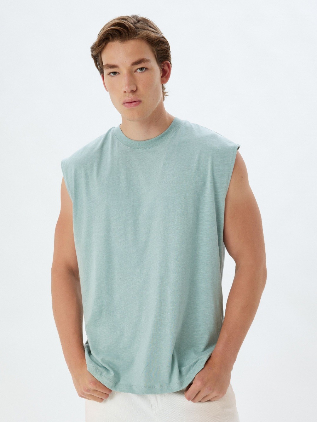 

Koton Men Solid Round Neck Cotton T-shirt, Green
