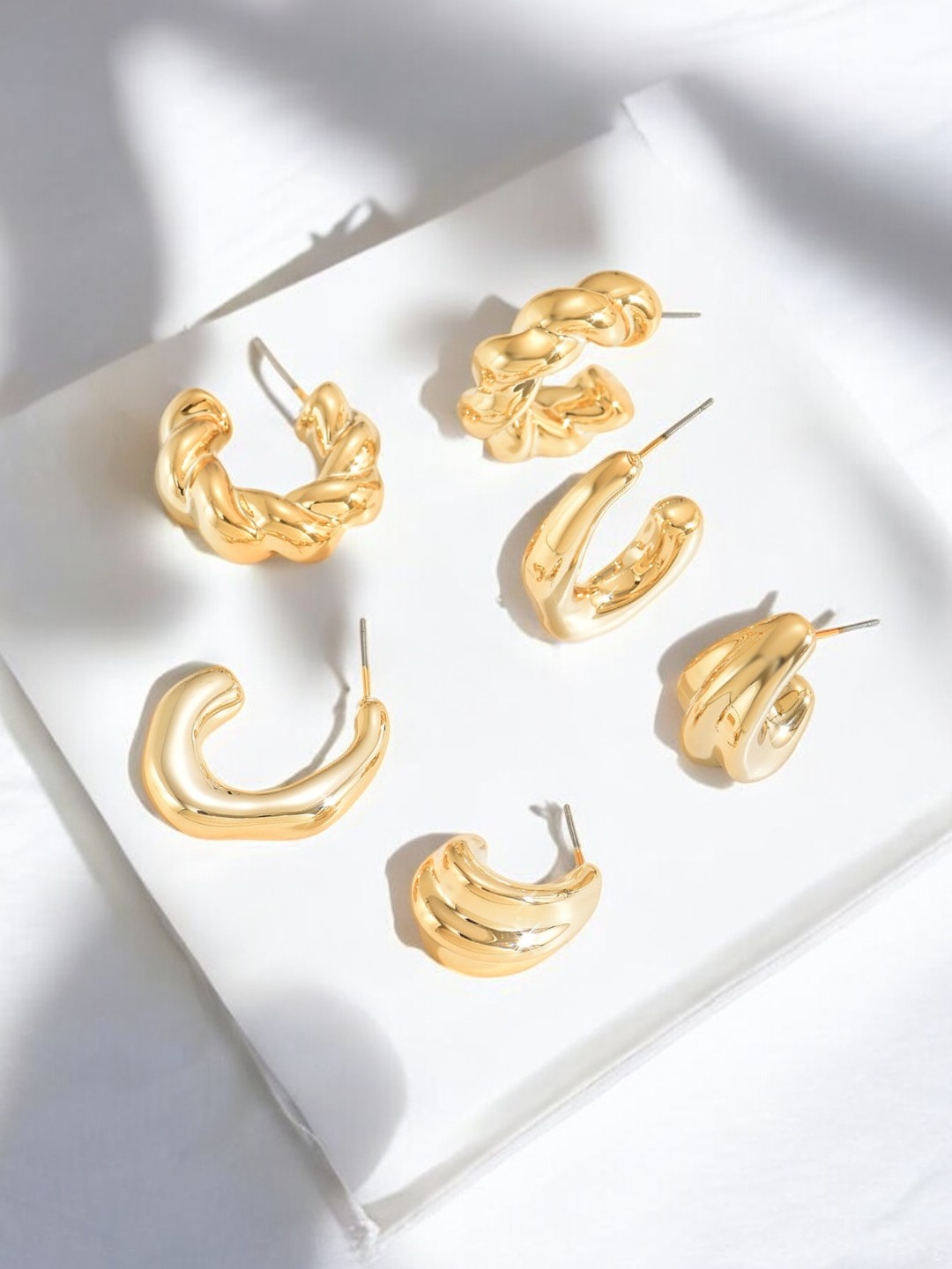 

Jewels Galaxy Set Of 3 Gold Plated Contemporary Half Hoop Earrings