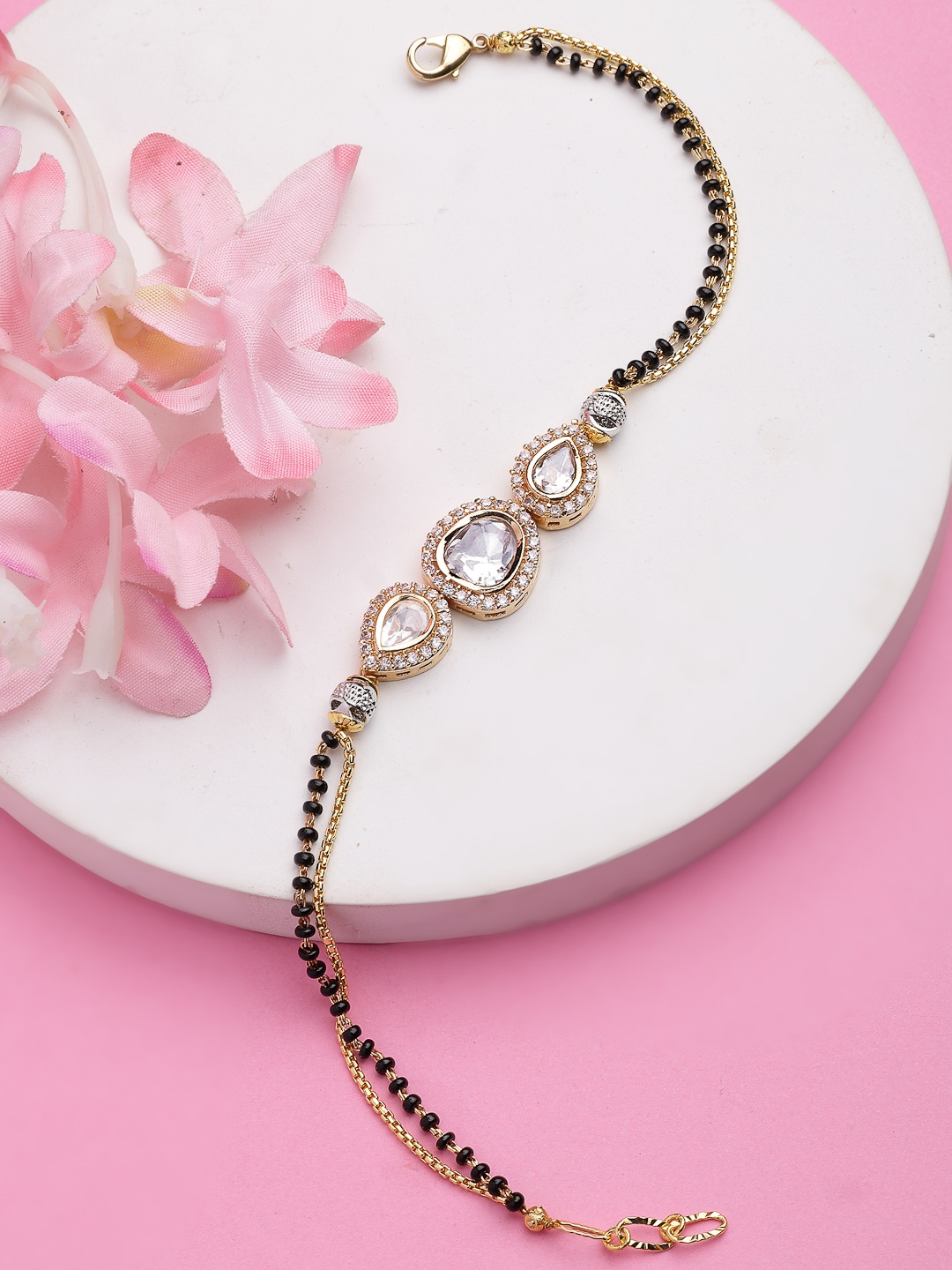 

NVR Gold-Plated AD Stone Studded & Beaded Bracelet Mangalsutra