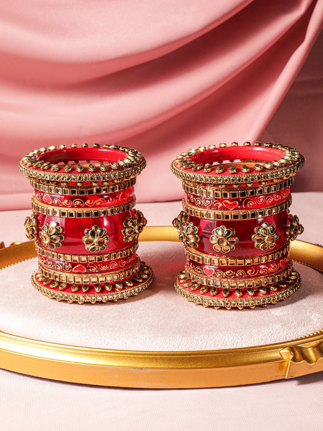 

Rubans Set of 18 Gold-Plated Bridal Chura Bangles with Floral Motifs and Red Detailing