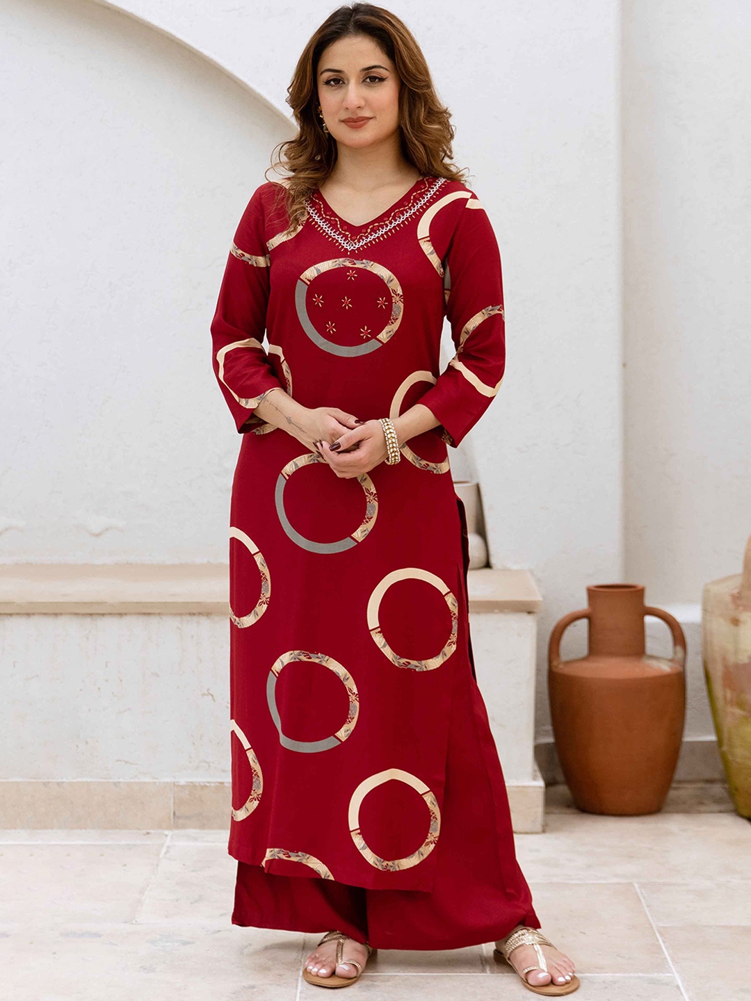 

Nehamta Women Printed Regular Work Kurta with Palazzos, Maroon