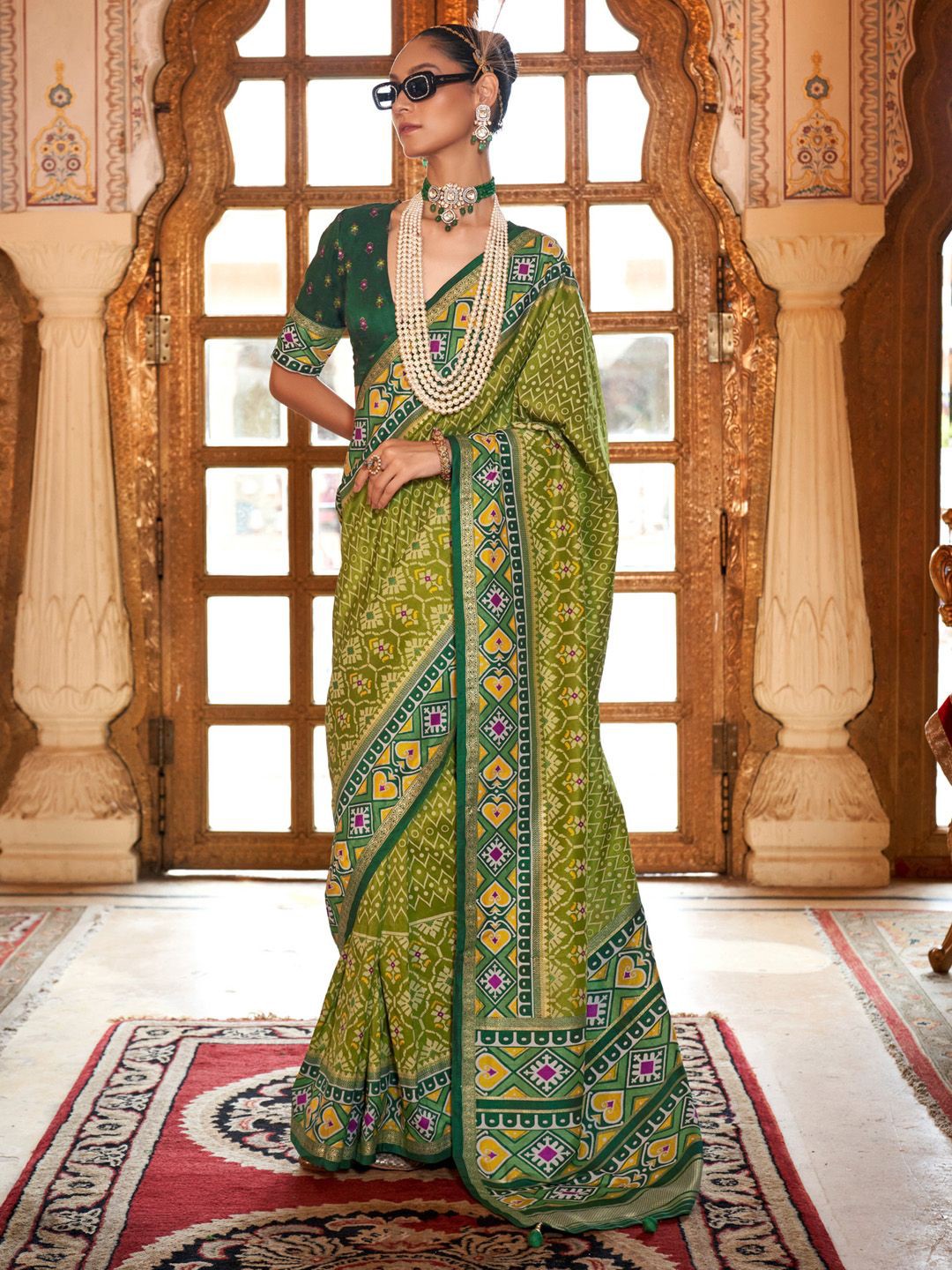 

Anouk Ethnic Motifs Zari Patola Saree, Green