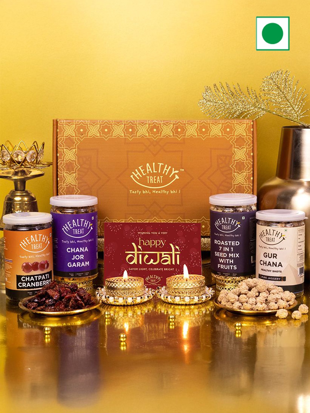 

Healthy Treat Set Of 7 Celebrations Diwali Gift Hamper With Diyas and Greeting Card, Orange