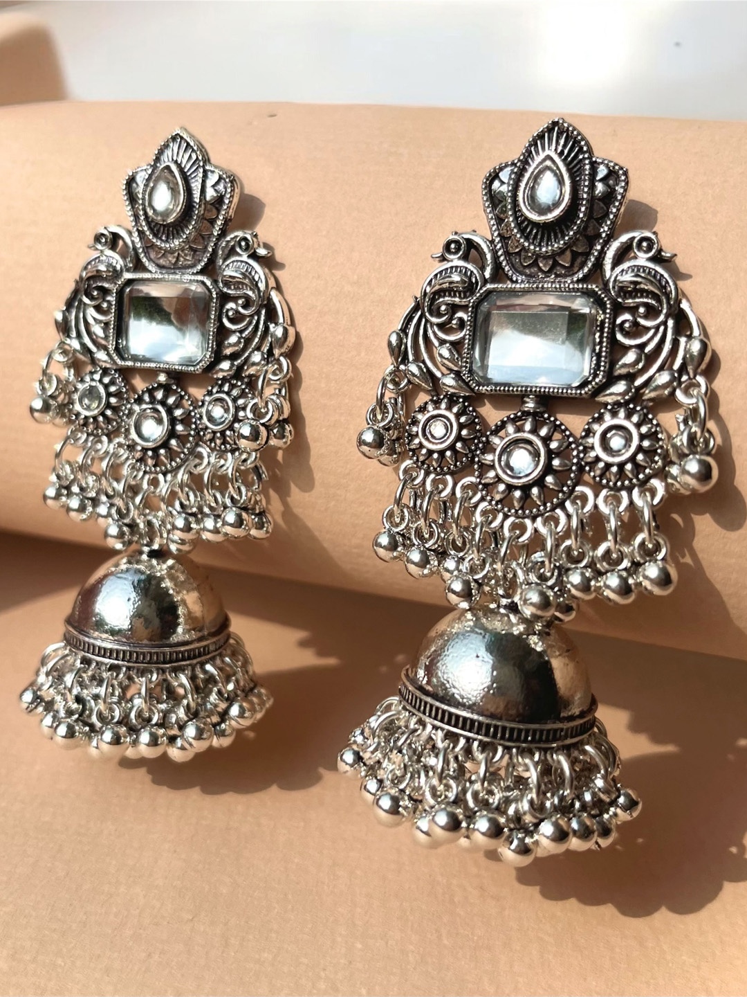 

SUBHAGALANKAR German Silver Plated Oxidised Stone Studded Jhumkas
