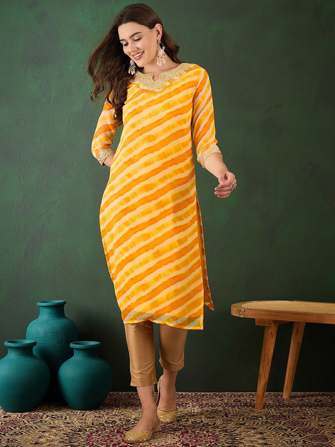 

Vastramyaa Women Striped Georgette Kurta, Yellow