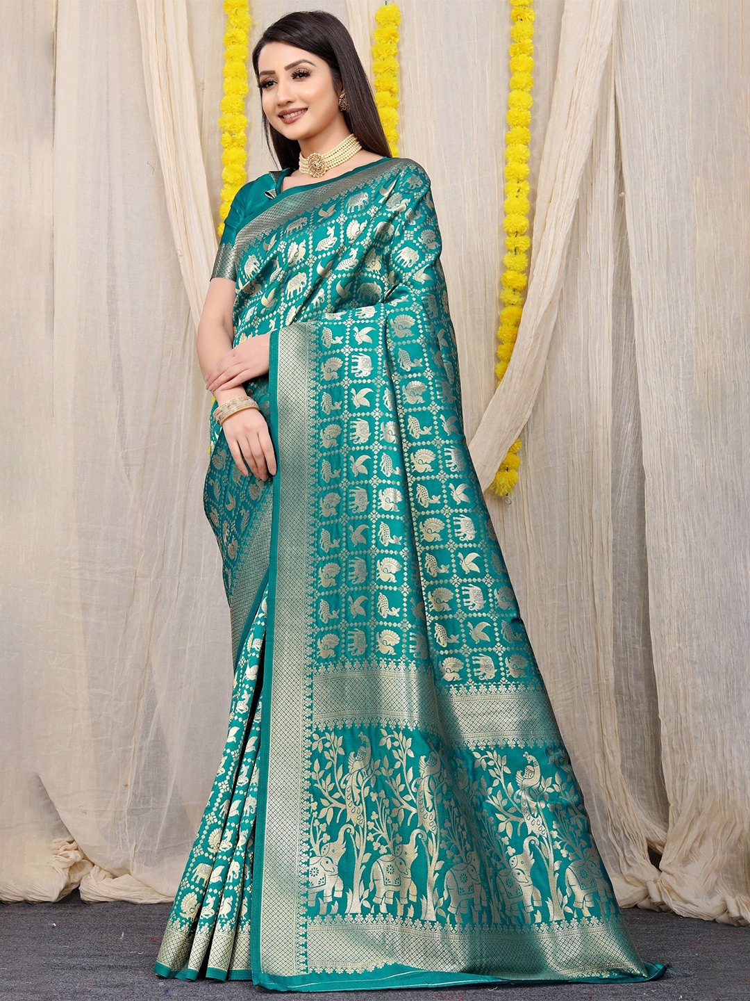 

Royal Rajgharana Saree Woven Design Zari Pure Silk Traditional Patola Sarees, Teal