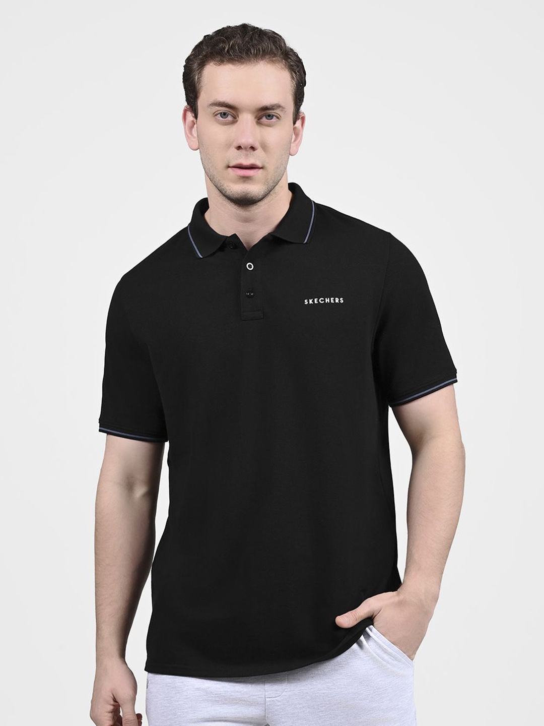 

Skechers Men Solid Polo Collar Cotton T-shirt, Black