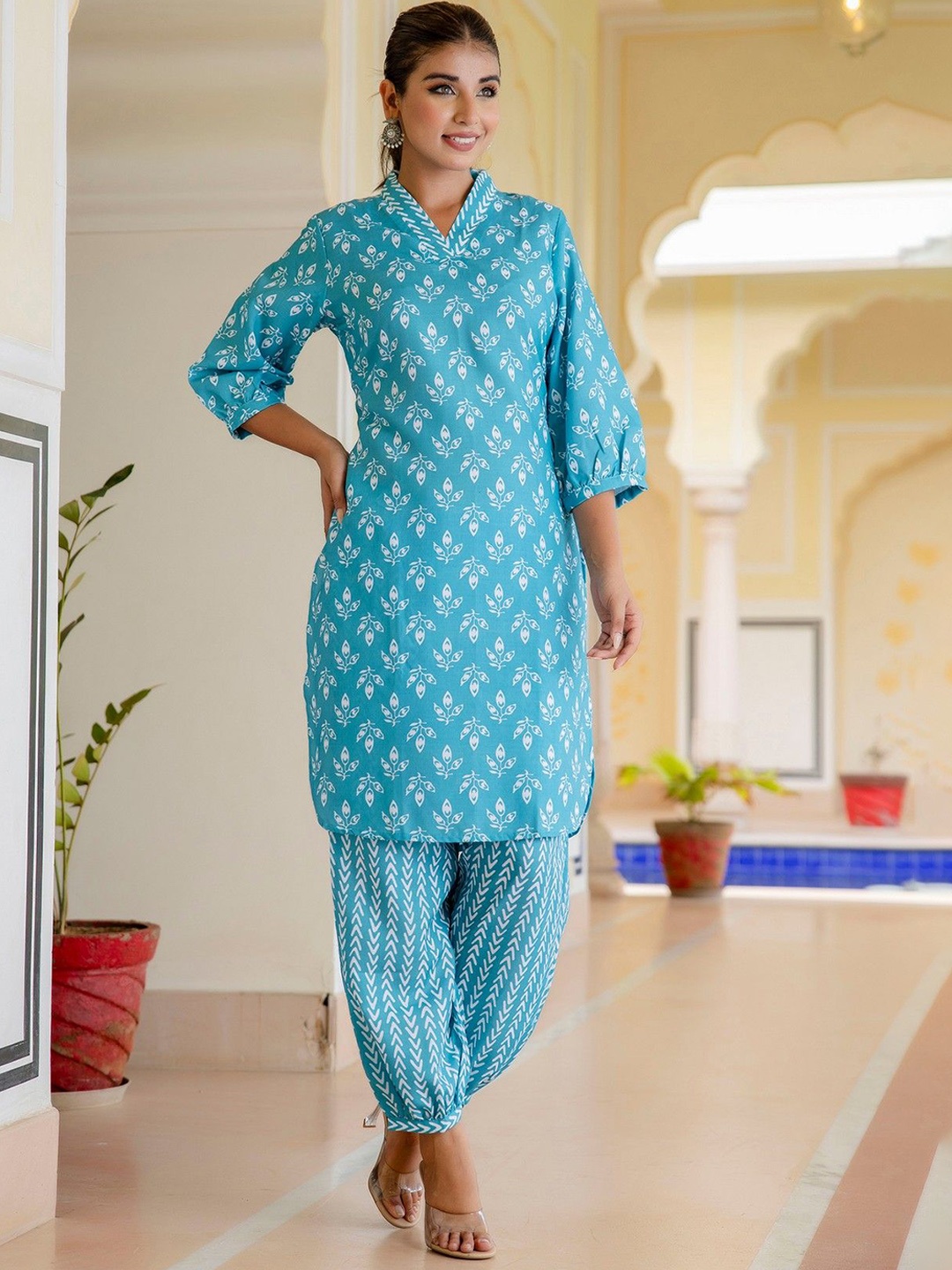 

KALINI Women Floral Printed Regular Kurta with Trousers, Teal