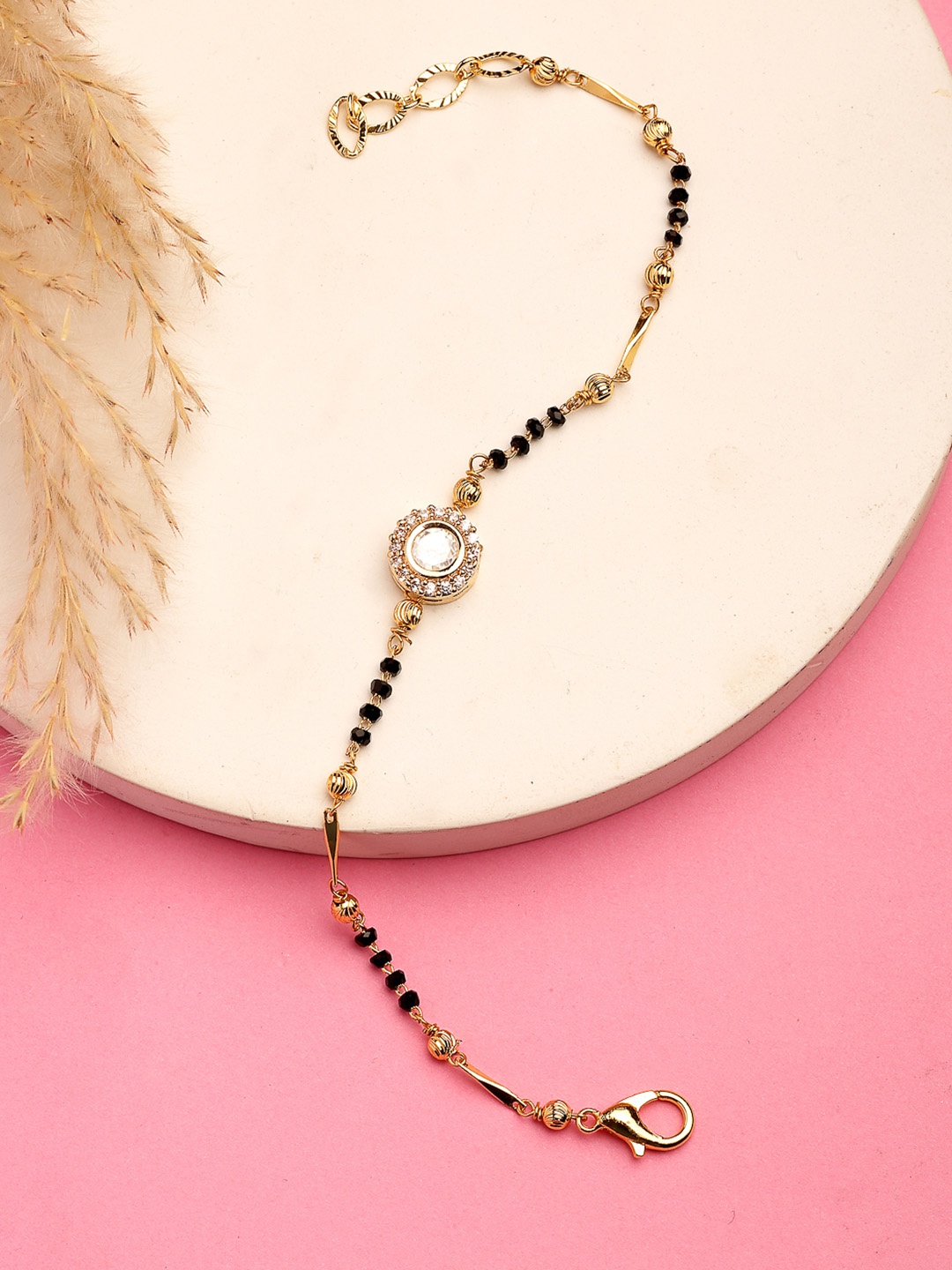 

NVR Gold-Plated AD Stone Studded & Beaded Bracelet Mangalsutra