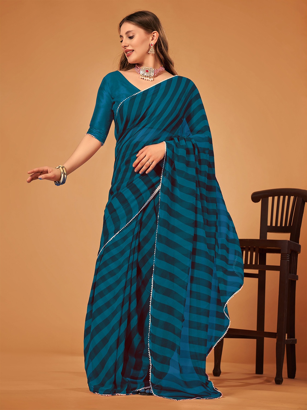 

limtd Women Pure Georgette Leheriya Saree, Teal