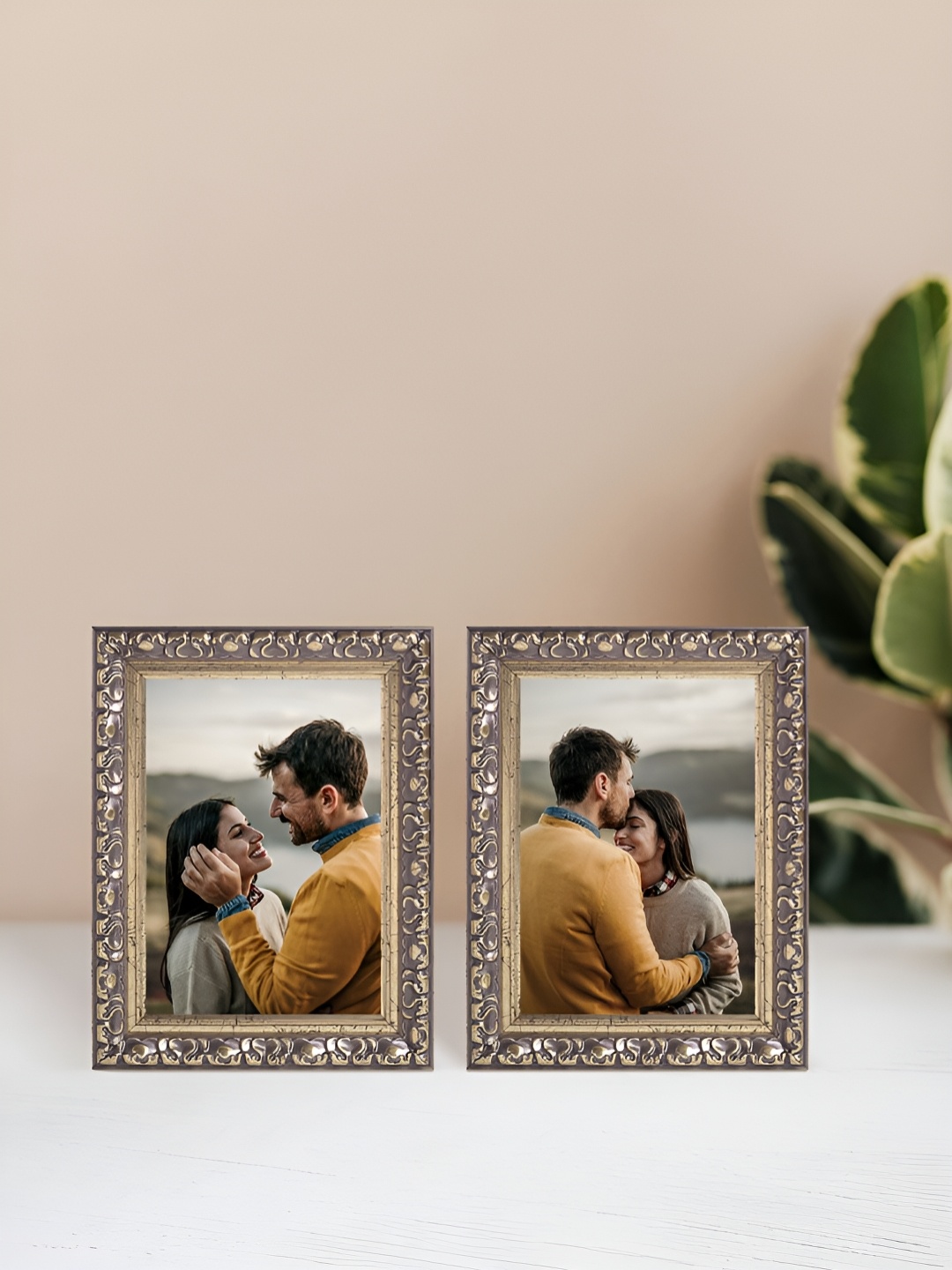 

Golden Peacock Gold Toned 2 Pieces Self Design Rectangular Table-Top Photo Frames